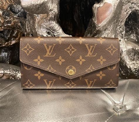 louis vuitton sarah wallet cheap|louis vuitton embossed wallet.